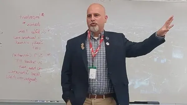 Joseph Nappi in front of whiteboard